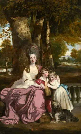 An elegantly dressed young woman, a little boy, girl, and a dog are gathered on a veranda in front of a sun-dappled landscape in this vertical portrait painting. All three people have pale skin with rosy cheeks.