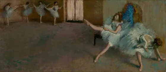In a dance studio, two ballerinas wearing knee-length tutus and ballet slippers sit on a bench and stretch to our right while four more pose at the back of the space, to our left, in this long, horizontal painting.