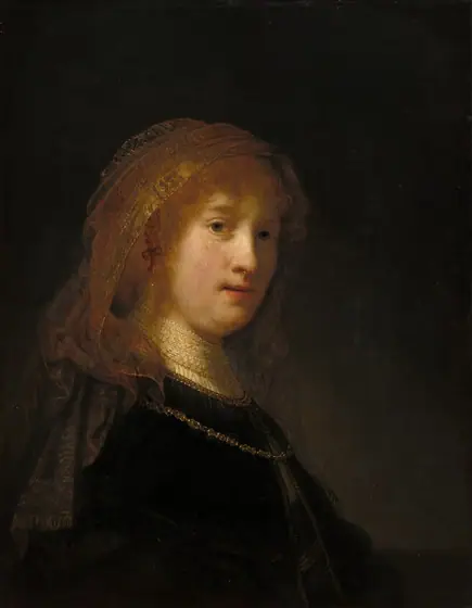 The face of a young woman with pale, peachy skin materializes from a deeply shadowed background in this vertical portrait painting. Shown from the waist up, her body is angled to our right, and her face turns to look at us.