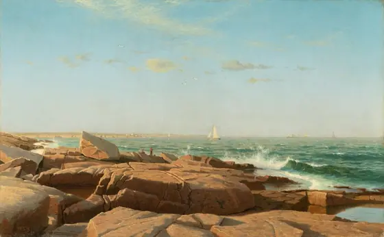 We look out across a band of broad, craggy boulders at an ocean bay dotted with boats in this horizontal landscape painting. The tops of the flat boulders are caramel brown in the sunlight and darker, rust-brown shadows down the sides.