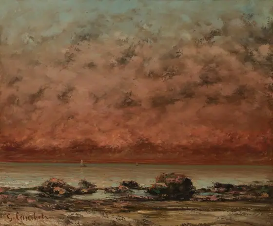 We stand on a beach lined with black rocks and boulders looking out onto the water below a brick-red sky that dominates this nearly square landscape painting.