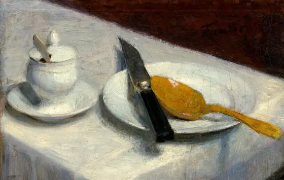 We look down at the end of a narrow table at a white plate, pot, knife, and spoon set on the white tablecloth in this horizontal still life painting.