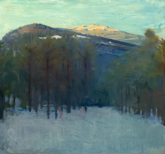 We look across a shaded field of snow, through a screen of loosely spaced trees at a cobalt-blue mountain that dominates this square landscape painting. The scene is painted with visible brushstrokes throughout.