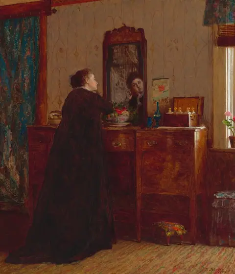 This painting shows a woman standing in front of a wooden dresser with a mirror, her back to us. We can see her face reflected in the mirror. She is gazing at her reflection with both of her hands lifted towards her slightly tilted face.