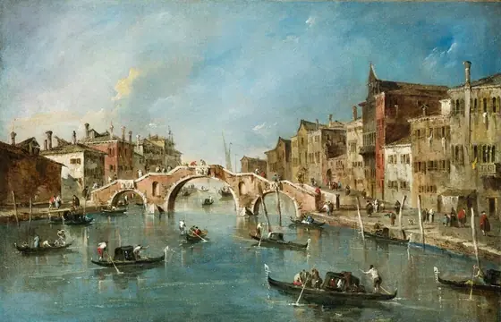 From a point of view over the water, we look across a bustling canal at a bridge, which is flanked by rows of buildings to each side in this horizontal painting.