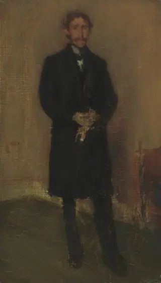 The image shows a person standing upright, facing slightly to the right. The person has indistinct facial features with a mustache and medium-length dark hair, wearing a dark overcoat and trousers with a white collar.