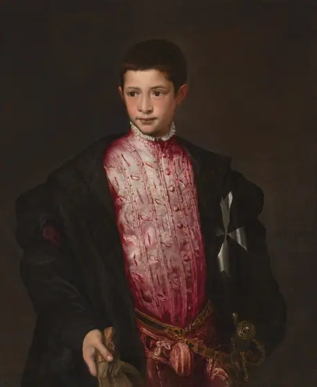 Shown from the hips up, a young boy with pale, peachy skin wears a voluminous, black cloak that nearly falls off his shoulders over a rose-pink tunic, with a sword hanging from one hip in this vertical portrait painting.