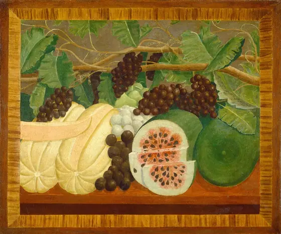 The image features a variety of fruit, including large white melons, a sliced red watermelon, and clusters of dark and white grapes with an assortment of green leaves.