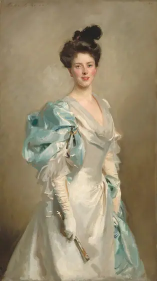 Shown from the knees up, a young woman with pale skin and flushed cheeks looks at us, wearing a long, shimmering white dress partially draped with powder-blue fabric in this vertical portrait painting.