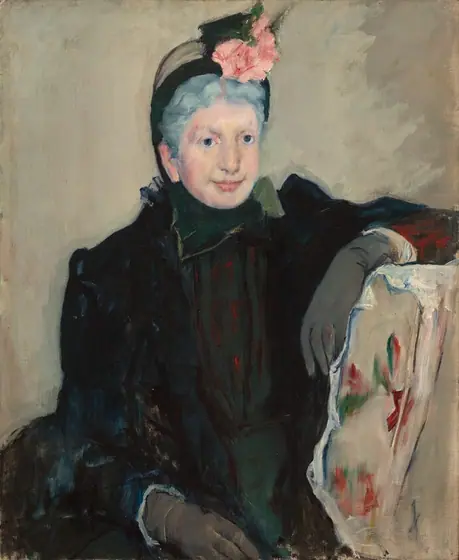 Shown from the lap up, an older woman with pale, slightly sagging skin and frosty gray hair sits facing us in this loosely painted vertical portrait.
