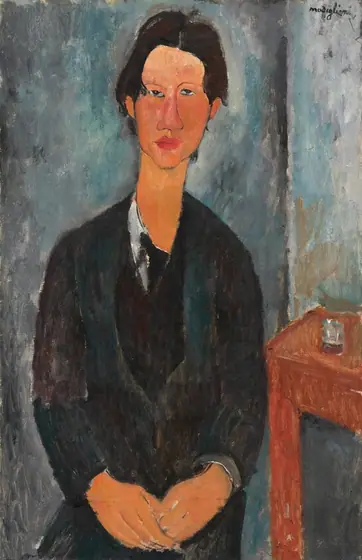 Shown from the lap up, a cleanshaven man with black hair and dark clothes faces us as he sits with his hands resting together in his lap in this stylized, vertical portrait painting.