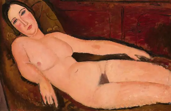 A nude woman lying across a brown divan in front of a russet-red wall is loosely painted with areas of mottled color in this horizontal composition.