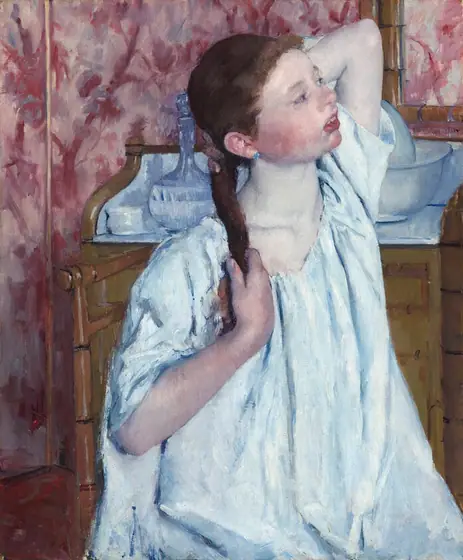 We look slightly down onto a round faced girl with flushed, pale skin sitting almost in profile on a ladderback chair, facing our right. Shown from the lap up, she almost takes up the height of this vertical painting.