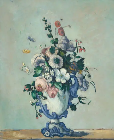 Rose and coral pink, vivid white, delphinium blue, and buttercup yellow flowers with deep green leaves are arranged in a blue and white vase in front of a pale sea-green background in this vertical still life painting.