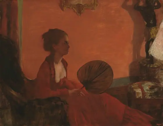 Dominated by tones of red and fire orange, this nearly square painting shows a seated woman leaning forward in a high-backed chair, holding a round, flat, leaf-shaped fan.
