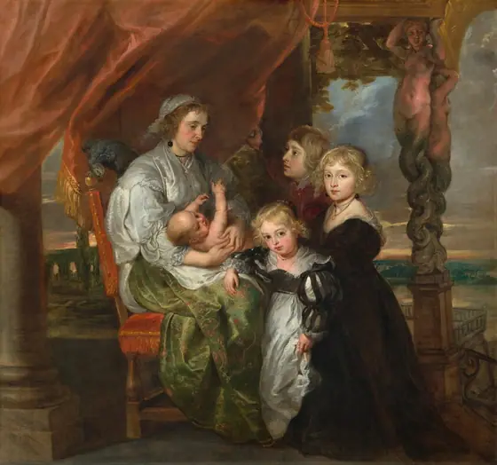 A seated woman with an infant on her lap and three children are clustered on a terrace overlooking green hills and a body of water in this square painting. They all have pale skin with flushed cheeks.