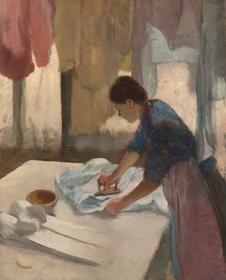 A woman with peachy skin stands facing our left in profile ironing a pale blue shirt on a white surface, possibly a table, with a line of pastel-colored shirts hanging in front of curtained windows opposite us in this vertical painting.