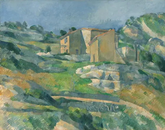 Pale beige, angular houses cluster at the center of the horizontal landscape painting. The hilly, rocky landscape around and below the houses is painted with cool blues and greens, and warm ivory and caramel brown beneath a pale blue sky.