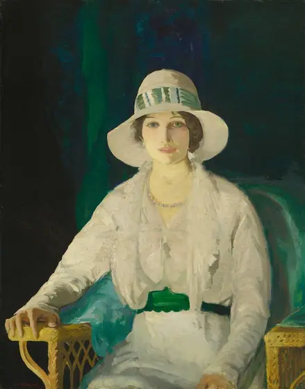 This painting is a portrait of a seated woman shown from the knees upwards. She is seated in a woven yellow armchair, with her right arm resting on one arm of the chair, while her left hand rests on her lap.