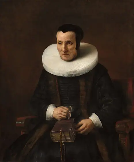 Shown from the knees up, a pale-skinned woman wearing a black dress with white cuffs and a wide, starched collar sits in a wooden chair against a dark brown background in this vertical portrait painting.