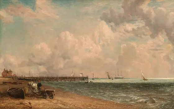 This painting shows a seaside view with a low horizon. A sandy beach is on the left, with ships and sailboats sailing on the water in the distance on the right.
