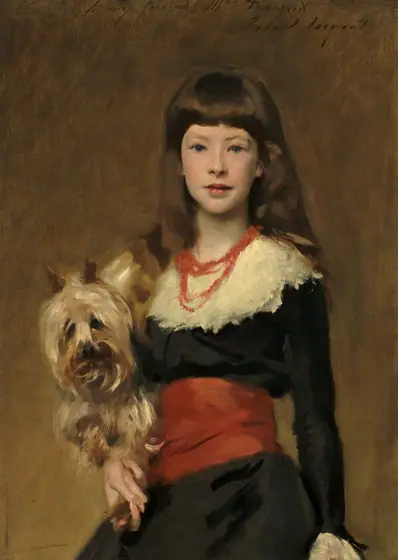 Shown from the hips up, a pale-skinned young girl wearing an ink-black garment with a cream-white collar and a coral-red sash and necklaces holds a terrier dog as she looks at us in this vertical portrait painting.
