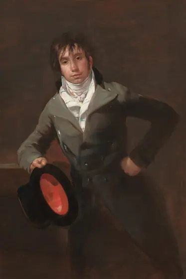 Shown from the knees up, a cleanshaven, young man with pale, peachy skin leans on his right elbow, to our left, against a ledge and holds a black top hat in that hand in this vertical portrait painting.